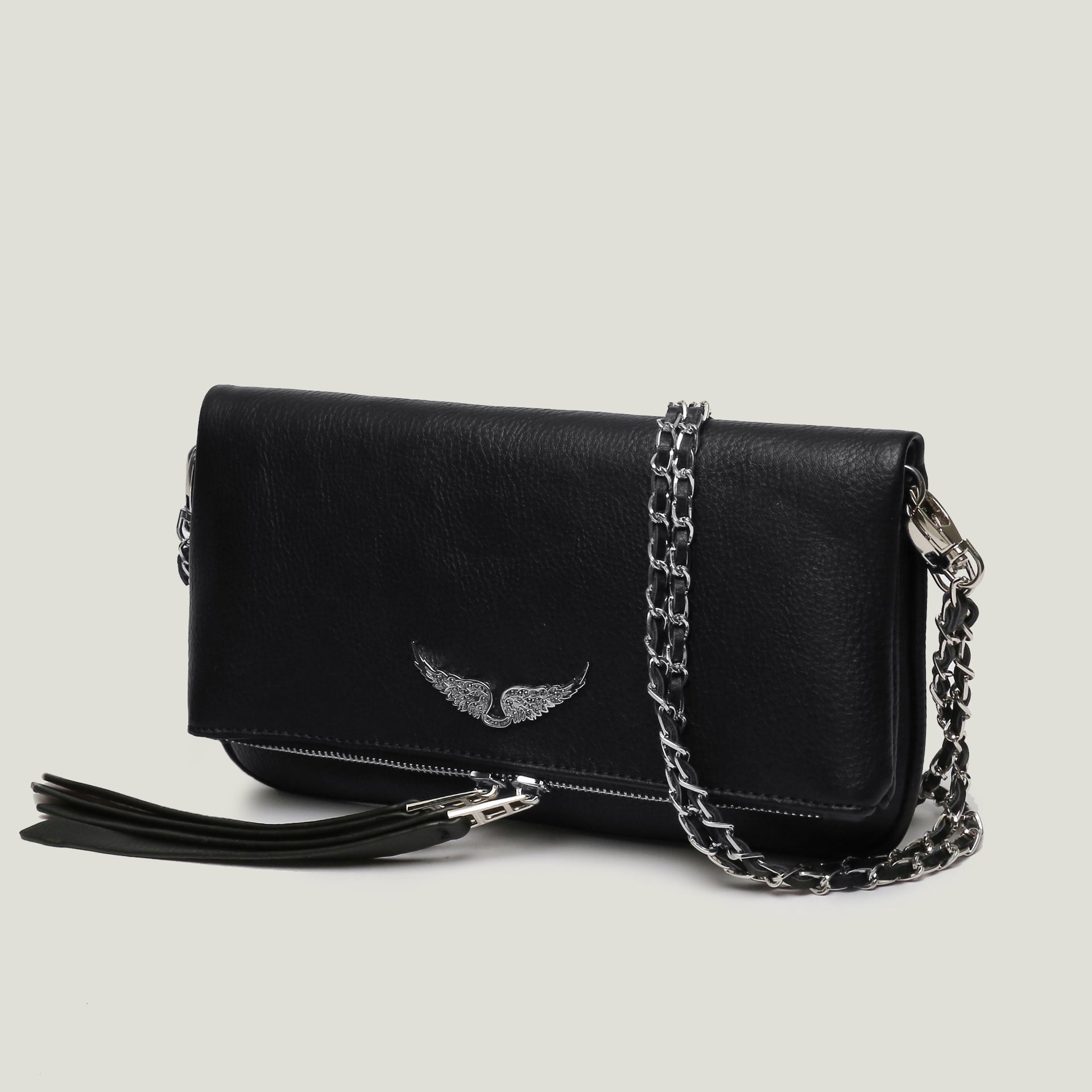 Shoulder bag with wing emblem